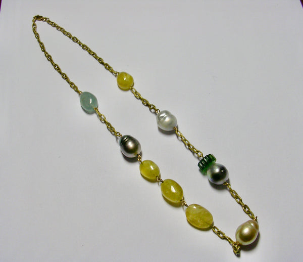 Necklace with South Sea pearls, black Tahitian pearls, carved tourmaline and aquamarines