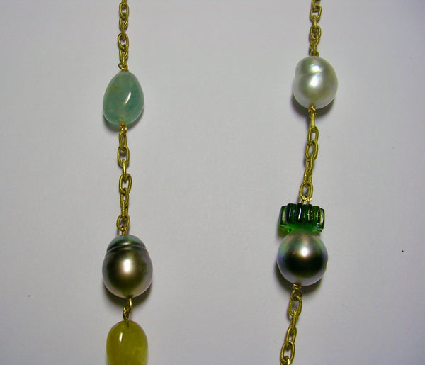 Necklace with South Sea pearls, black Tahitian pearls, carved tourmaline and aquamarines