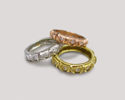 Trio Of Stacking Bands With "V" Motif